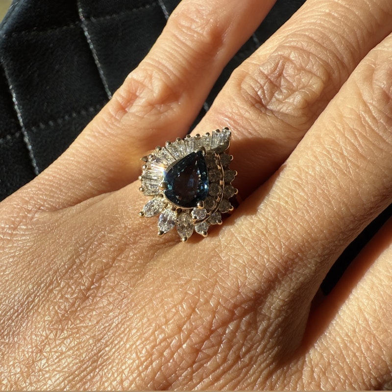 Pear Shaped Teal Sapphire and Diamond Spiral Halo Ring