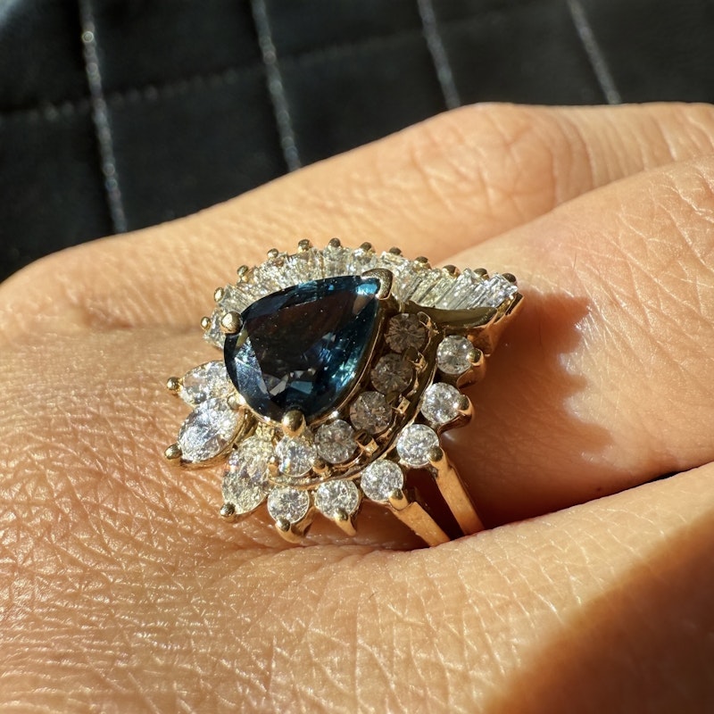 Pear Shaped Teal Sapphire and Diamond Spiral Halo Ring