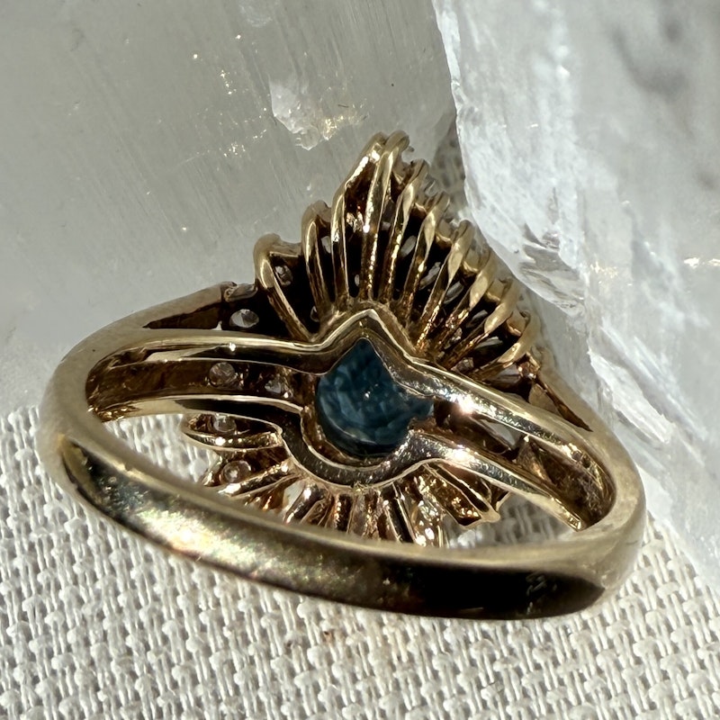 Pear Shaped Teal Sapphire and Diamond Spiral Halo Ring
