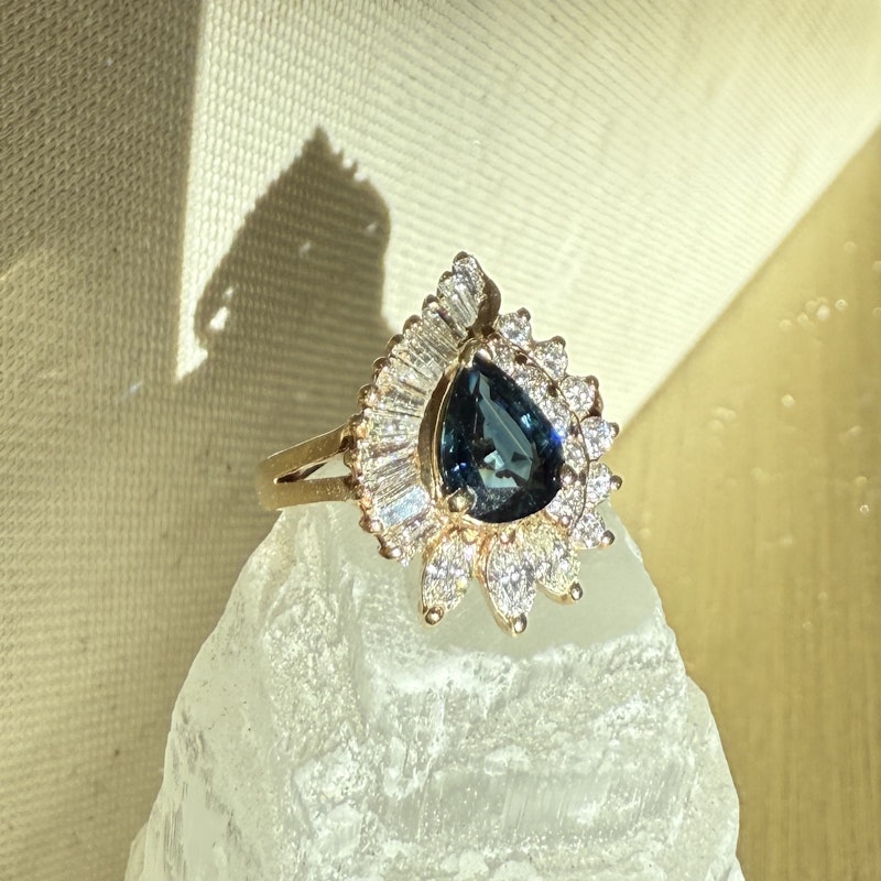 Pear Shaped Teal Sapphire and Diamond Spiral Halo Ring