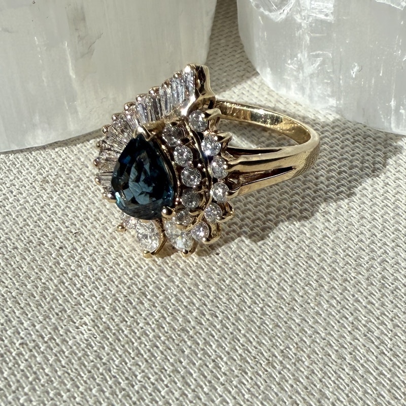 Pear Shaped Teal Sapphire and Diamond Spiral Halo Ring