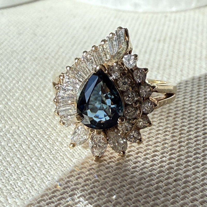 Pear Shaped Teal Sapphire and Diamond Spiral Halo Ring