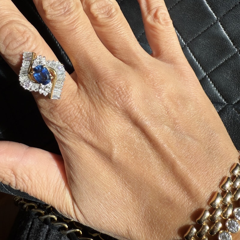 Oval Cut Blue Sapphire & Diamond Marquise Halo Ring
