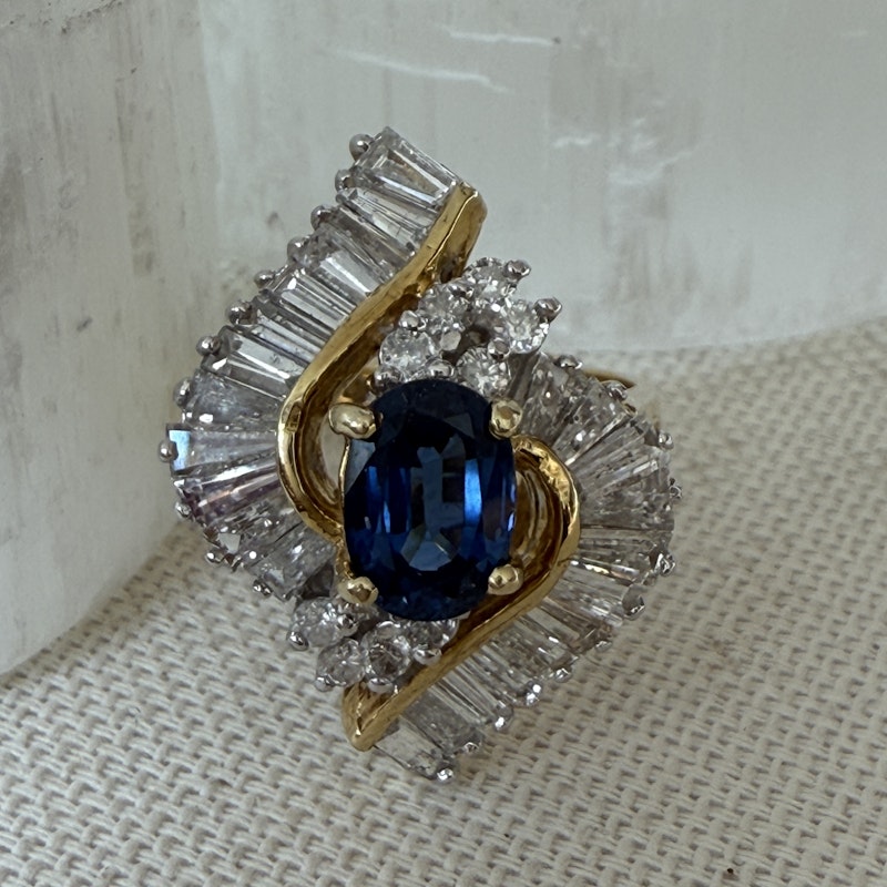 Oval Cut Blue Sapphire & Diamond Marquise Halo Ring