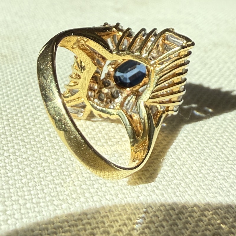 Oval Cut Blue Sapphire & Diamond Marquise Halo Ring