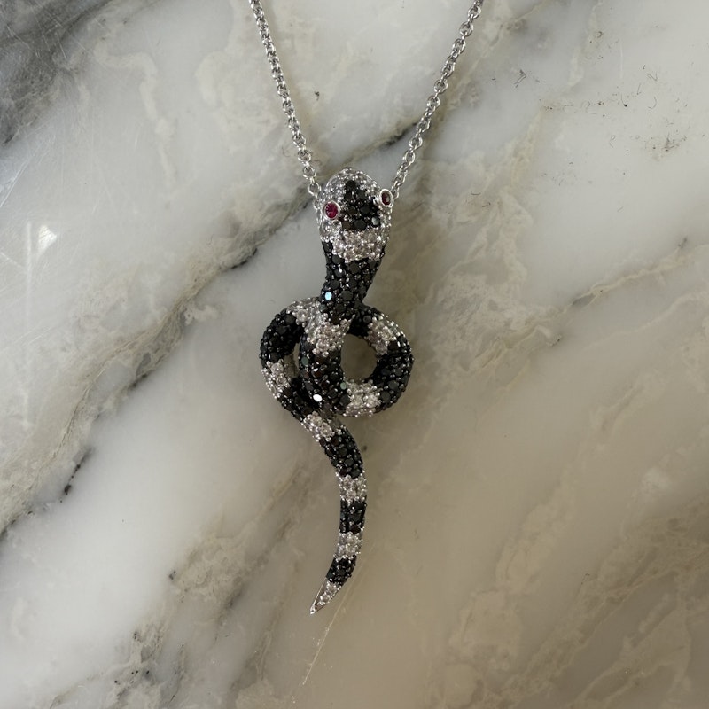 Black & White Diamond Snake Necklace with Ruby Eyes