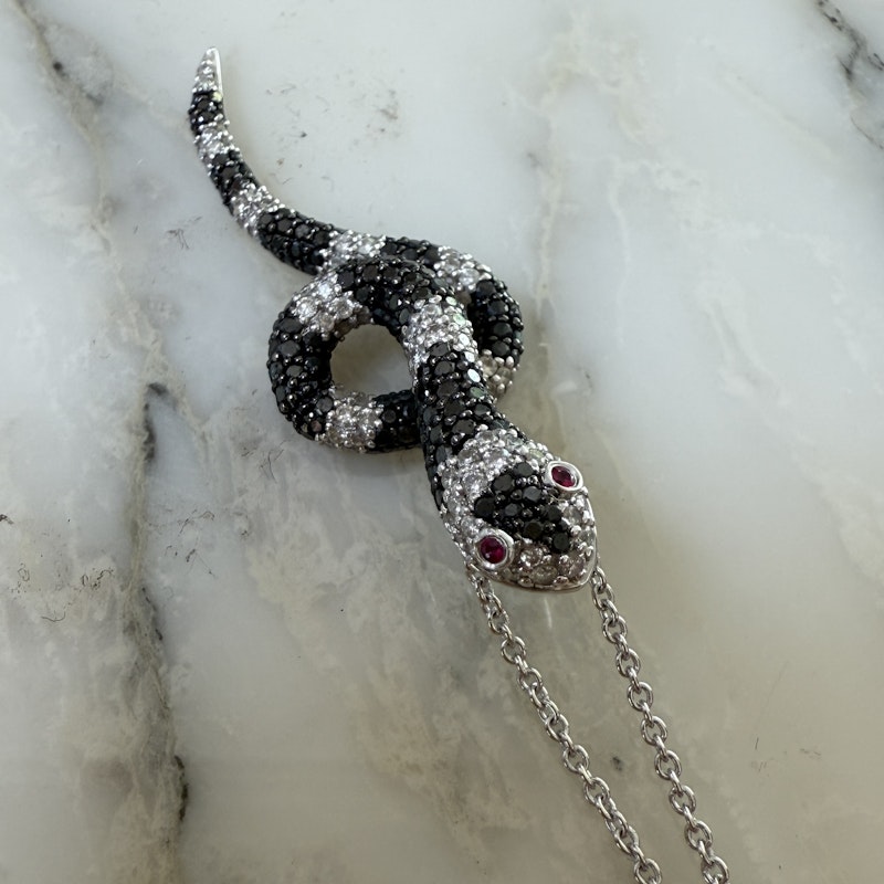 Black & White Diamond Snake Necklace with Ruby Eyes