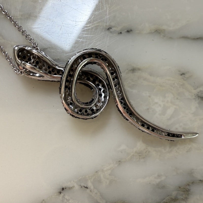 Black & White Diamond Snake Necklace with Ruby Eyes