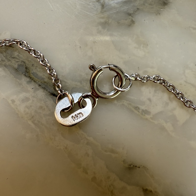 Black & White Diamond Snake Necklace with Ruby Eyes