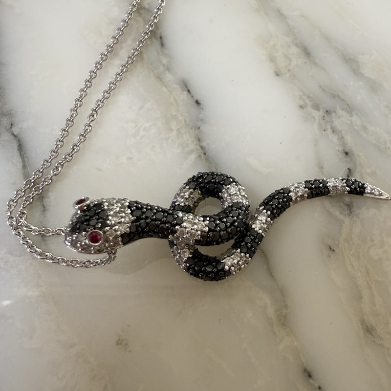 Black & White Diamond Snake Necklace with Ruby Eyes