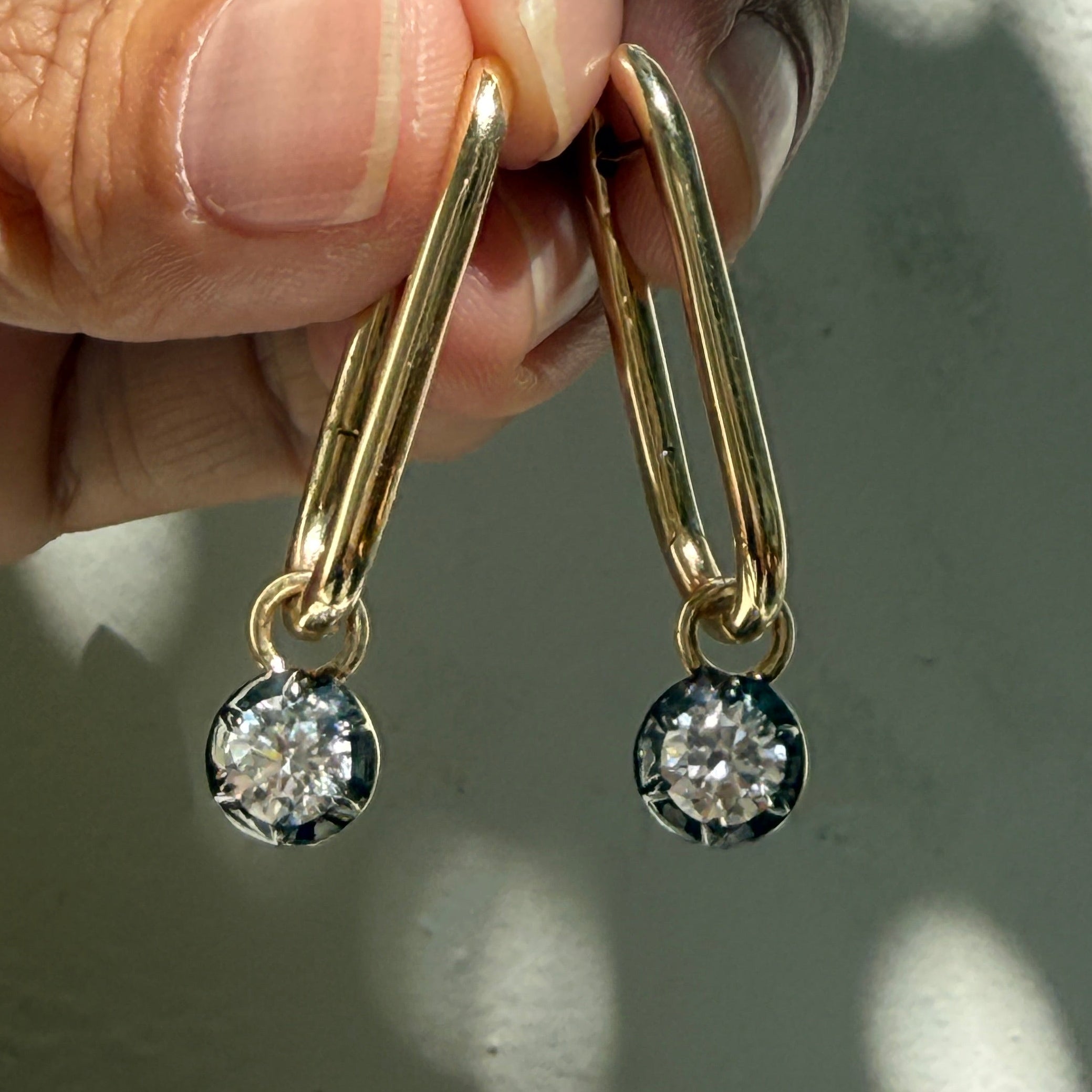 14k Yellow Gold Oval Hoop Earrings with Black Rhodium Round Diamond Drop