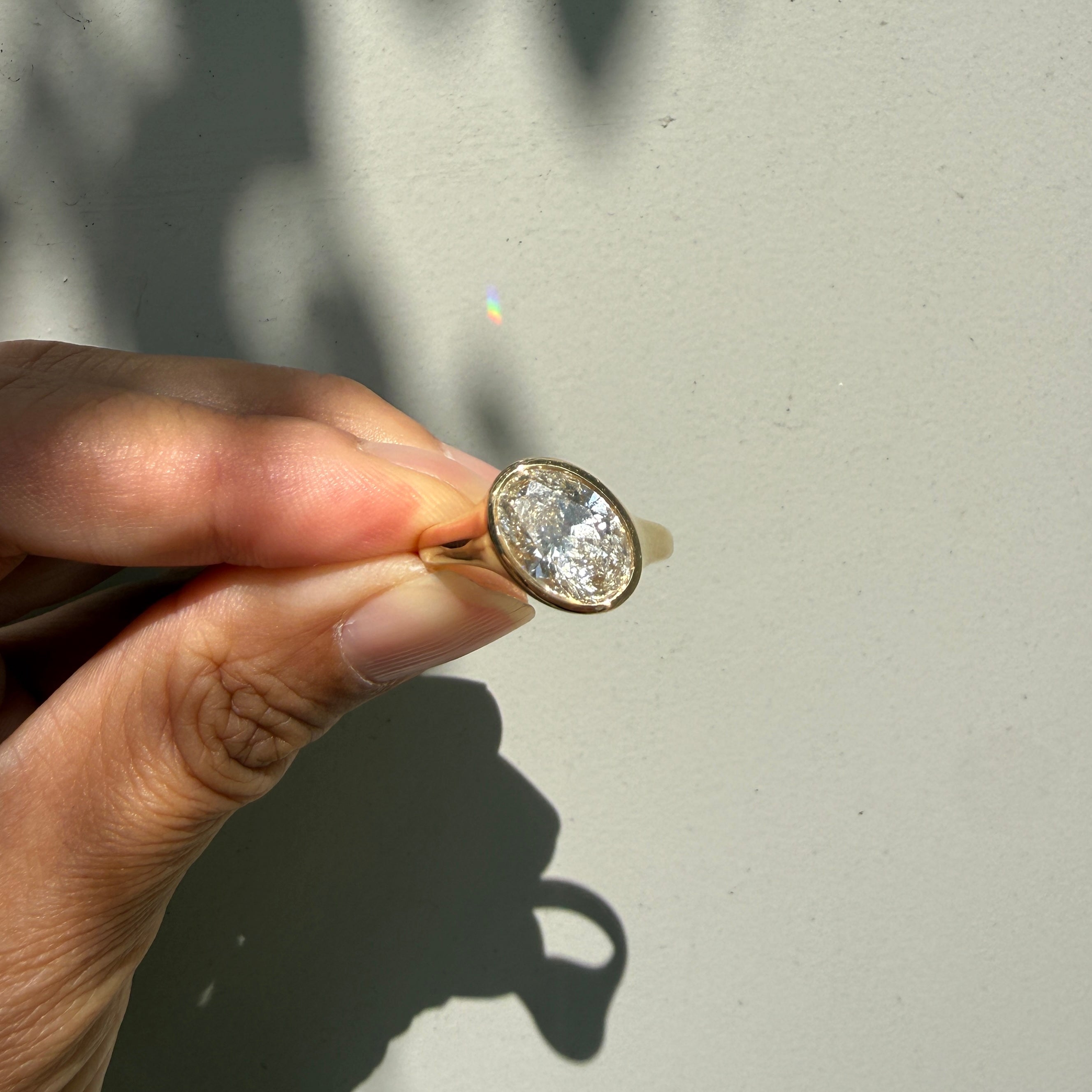 14k Yellow Gold Offset East-West Oval Diamond Ring
