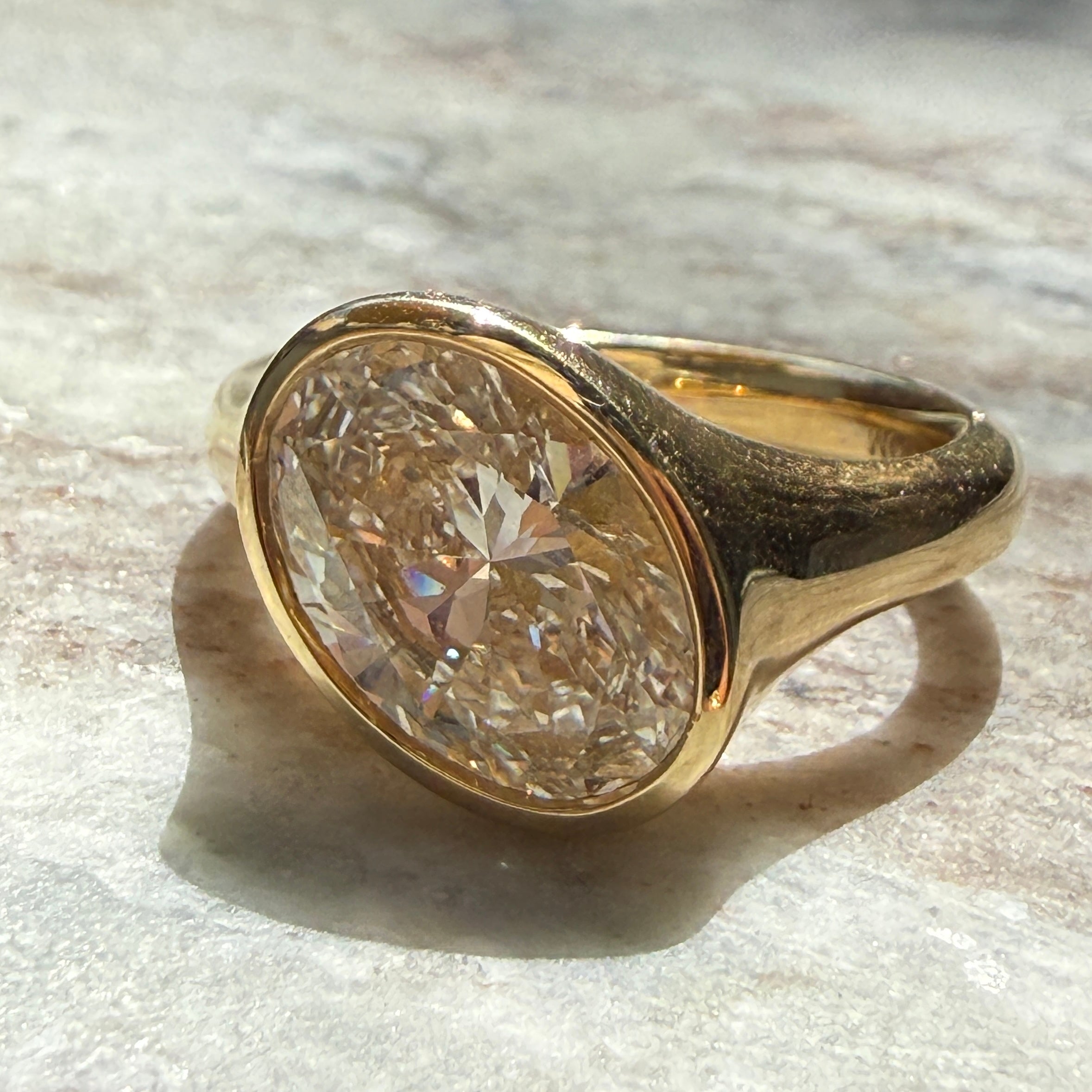 14k Yellow Gold Offset East-West Oval Diamond Ring