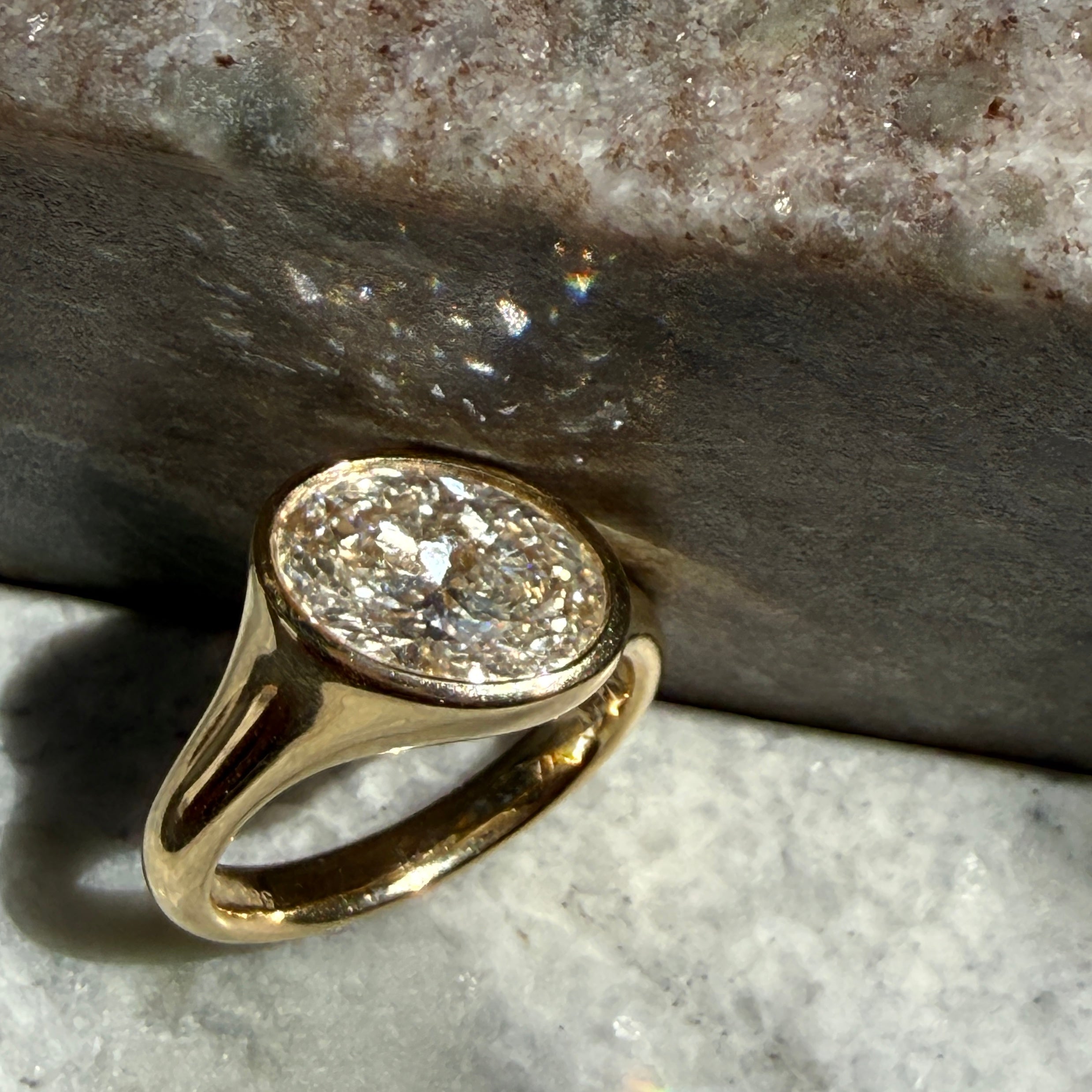 14k Yellow Gold Offset East-West Oval Diamond Ring