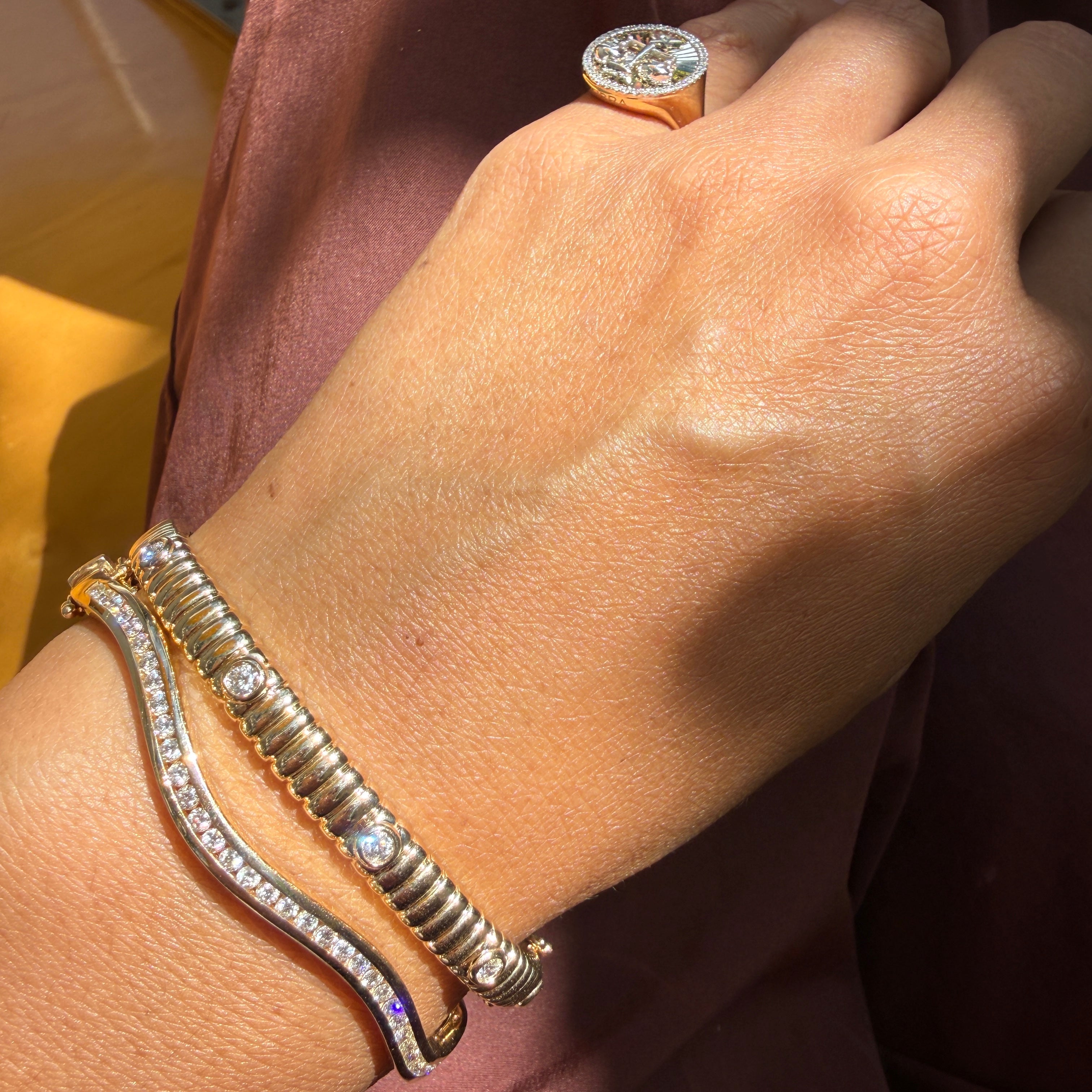 14k Yellow Gold Channel Set Diamond Wave Bangle
