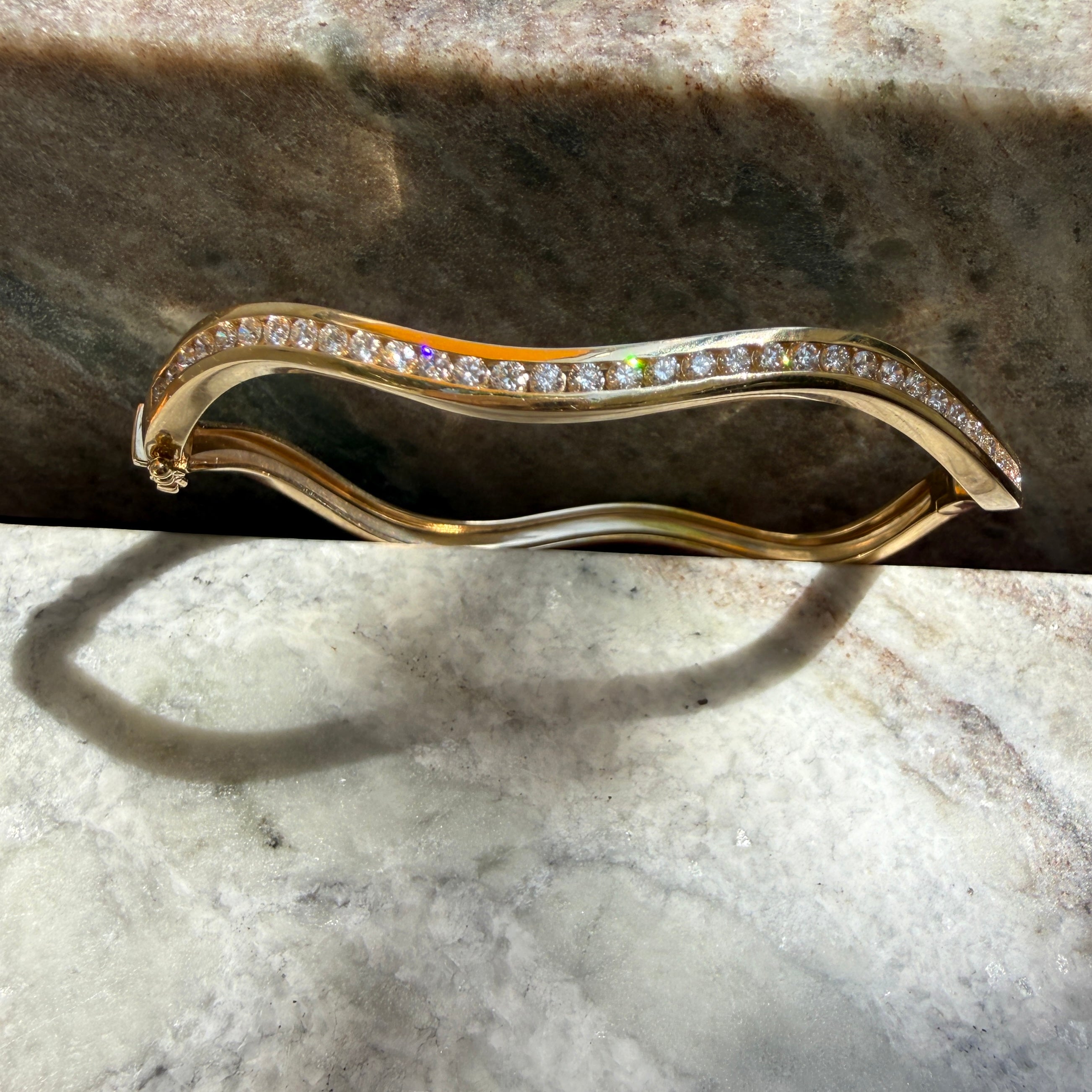14k Yellow Gold Channel Set Diamond Wave Bangle
