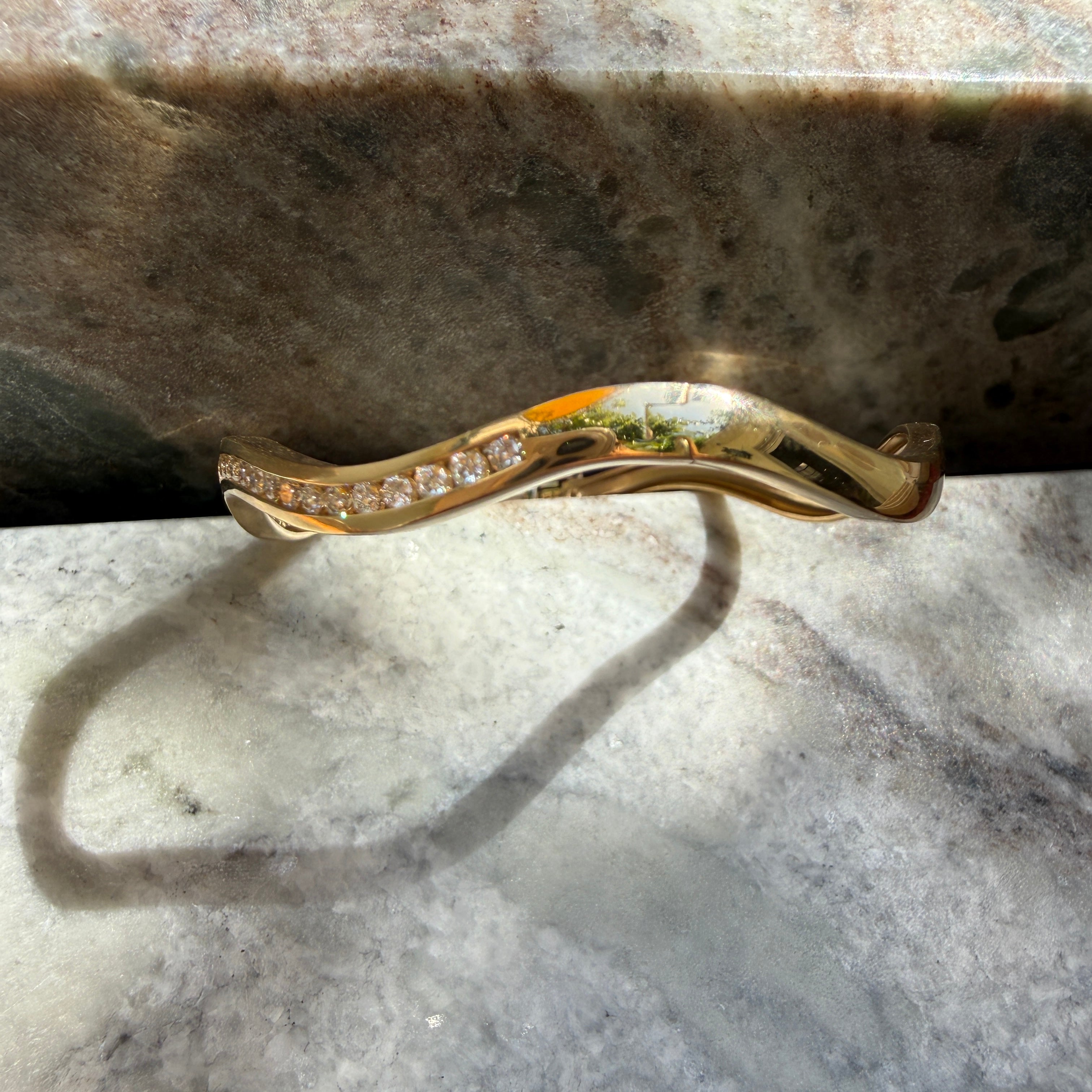 14k Yellow Gold Channel Set Diamond Wave Bangle